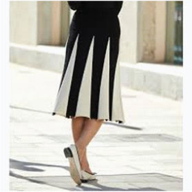 sketch of woman wearing black and white godet skirt